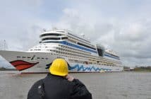 AIDAmar cruise ship leaves Papenburg wharf