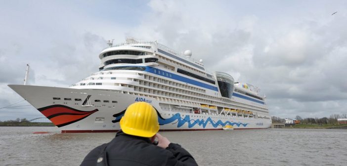 AIDAmar cruise ship leaves Papenburg wharf